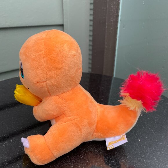 Item photo. Show Listing Details page. Listing Pokemon Charmander w Flower 5" Of - Picture 2 of 6